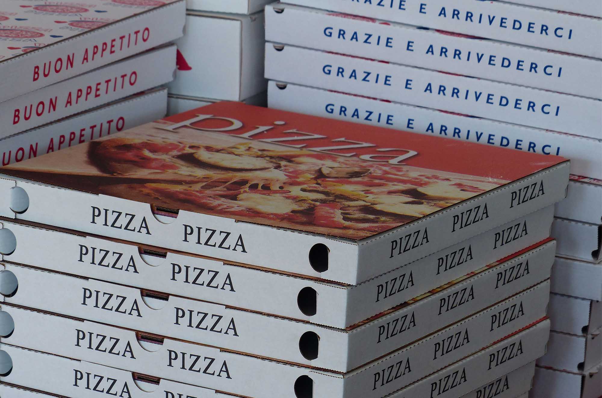 Stacked pizza boxes