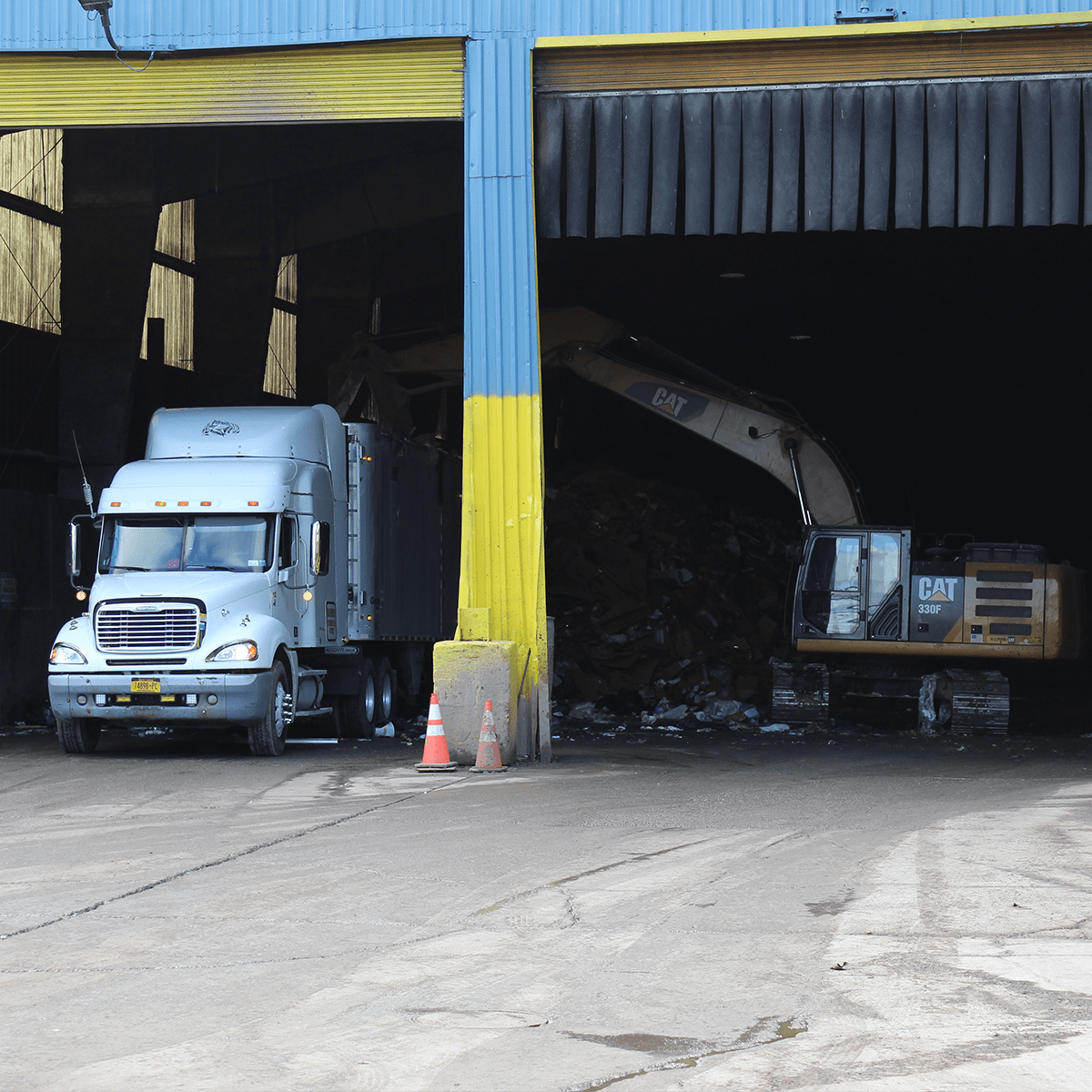 Transporting waste into truck