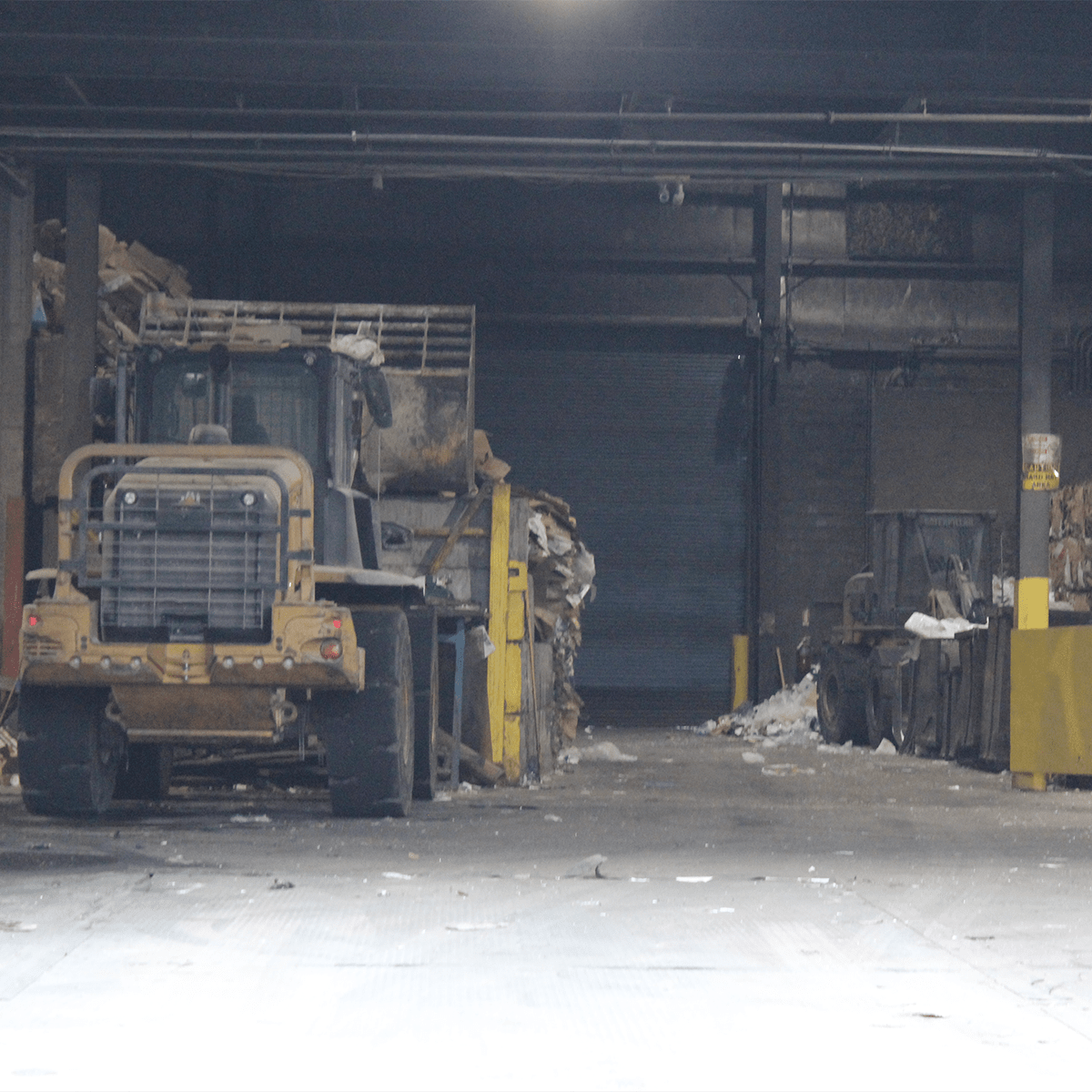 Tractors transporting matierial inside building