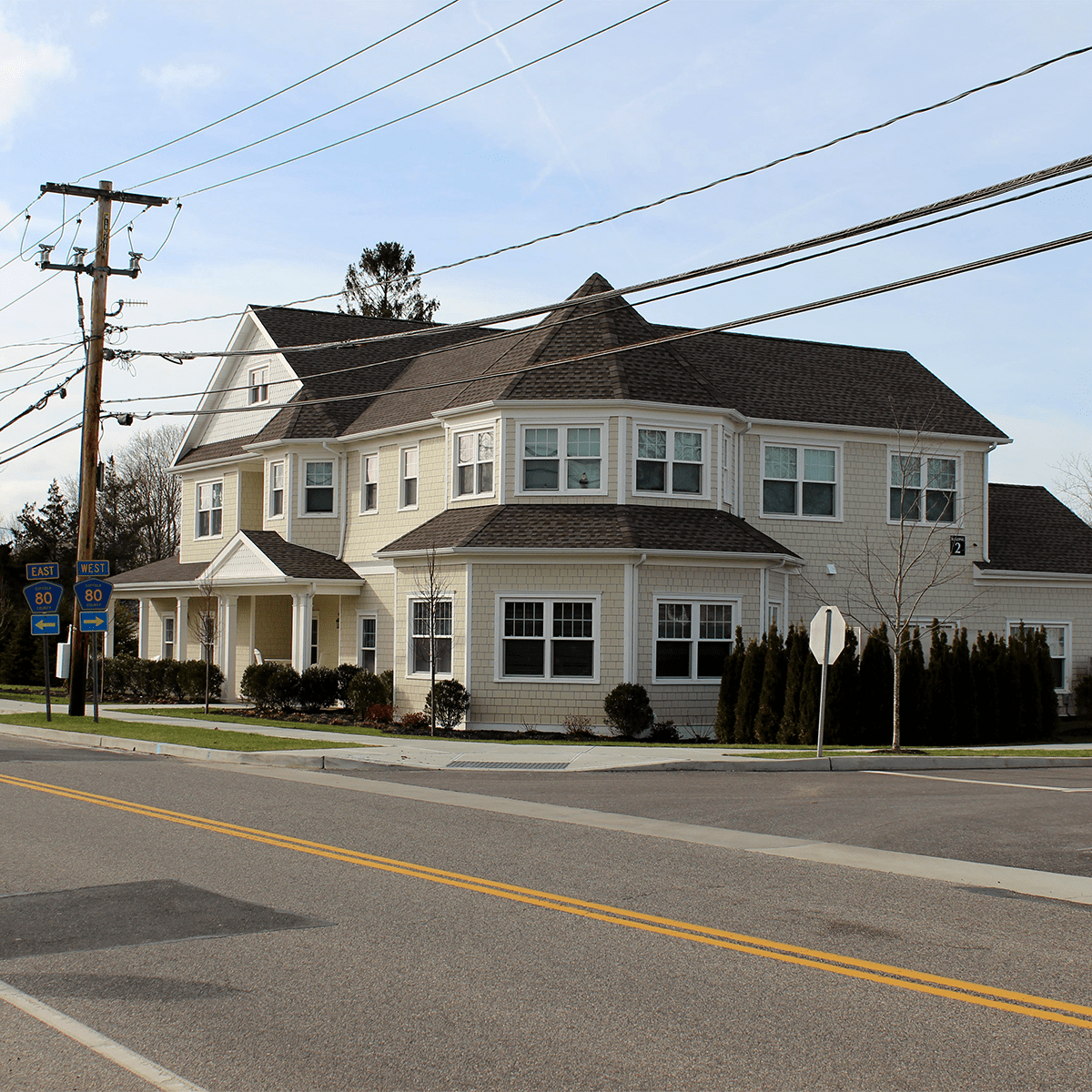 Speonk building from across street intersection of 80 east and west